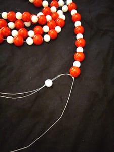 Putting a bead photos