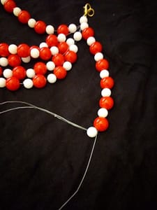 Putting a bead 2 photos