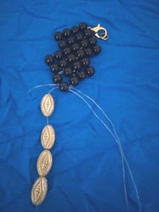 Putting the strings in the other bead