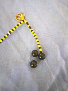 3 cluster beads of a necklace formed