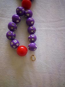 Adding the glittering necklace hook 