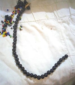 37 black beads 