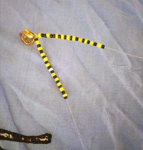 Yellow and black 23 beads