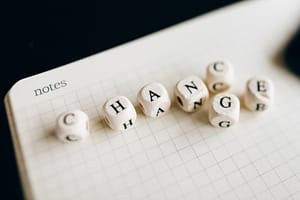 The word change written on dices