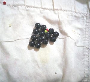 Step 1 adding of maasai beads to the black beads